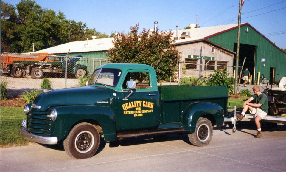 Quality Care green vintage truck from the 1950's